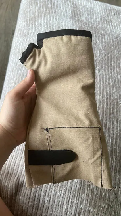 Khaki prototype heated cuff with a black panel