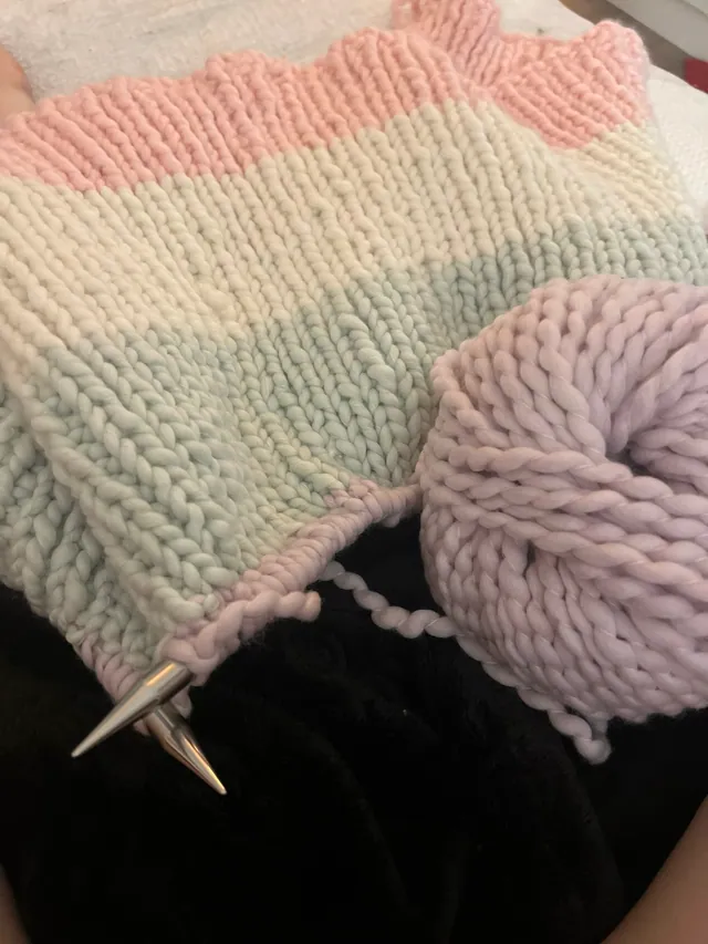 Chunky pastel knit in progress on needles